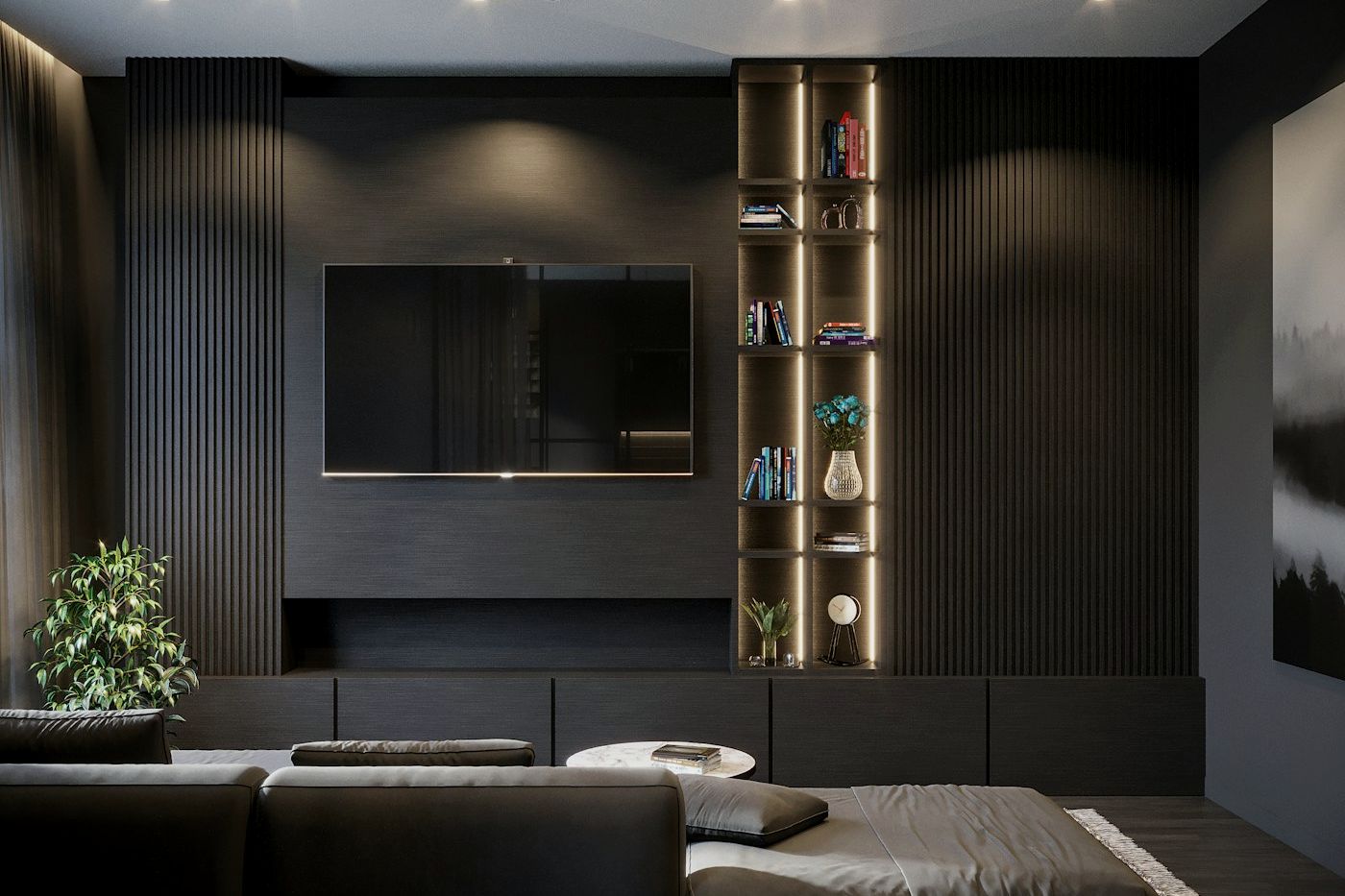 A dark, joinery-lined living room with a wall-mounted screen and concealed lighting.